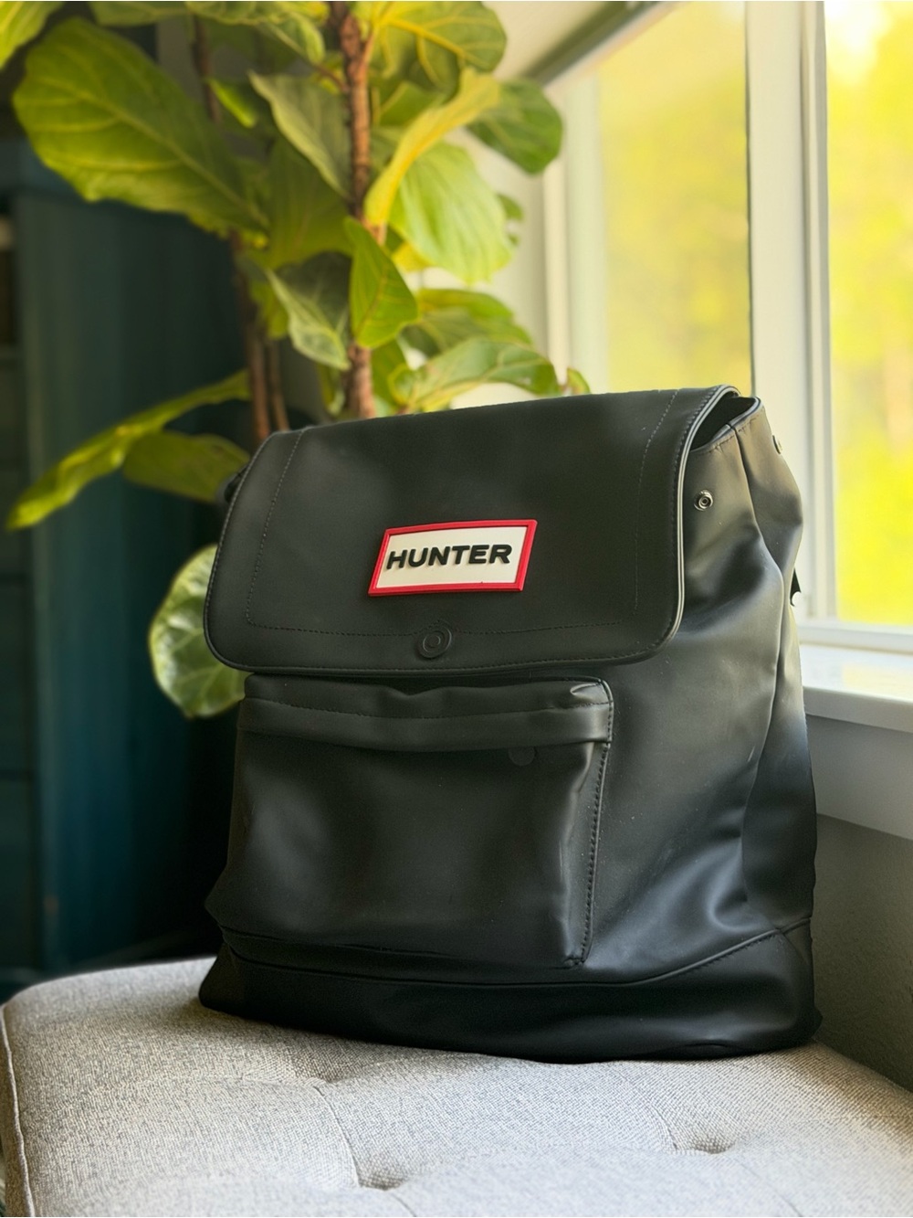 Hunter waterproof Black Backpack with Red Logo Accent